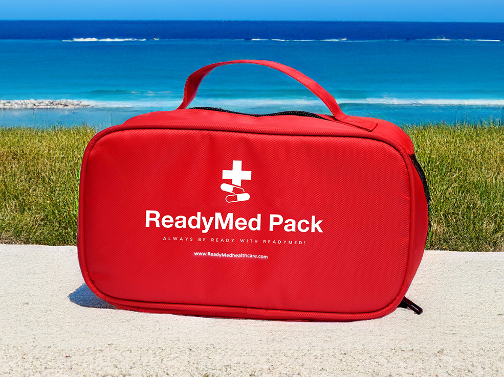 ReadyMed Travel Pack in front of a beach scene